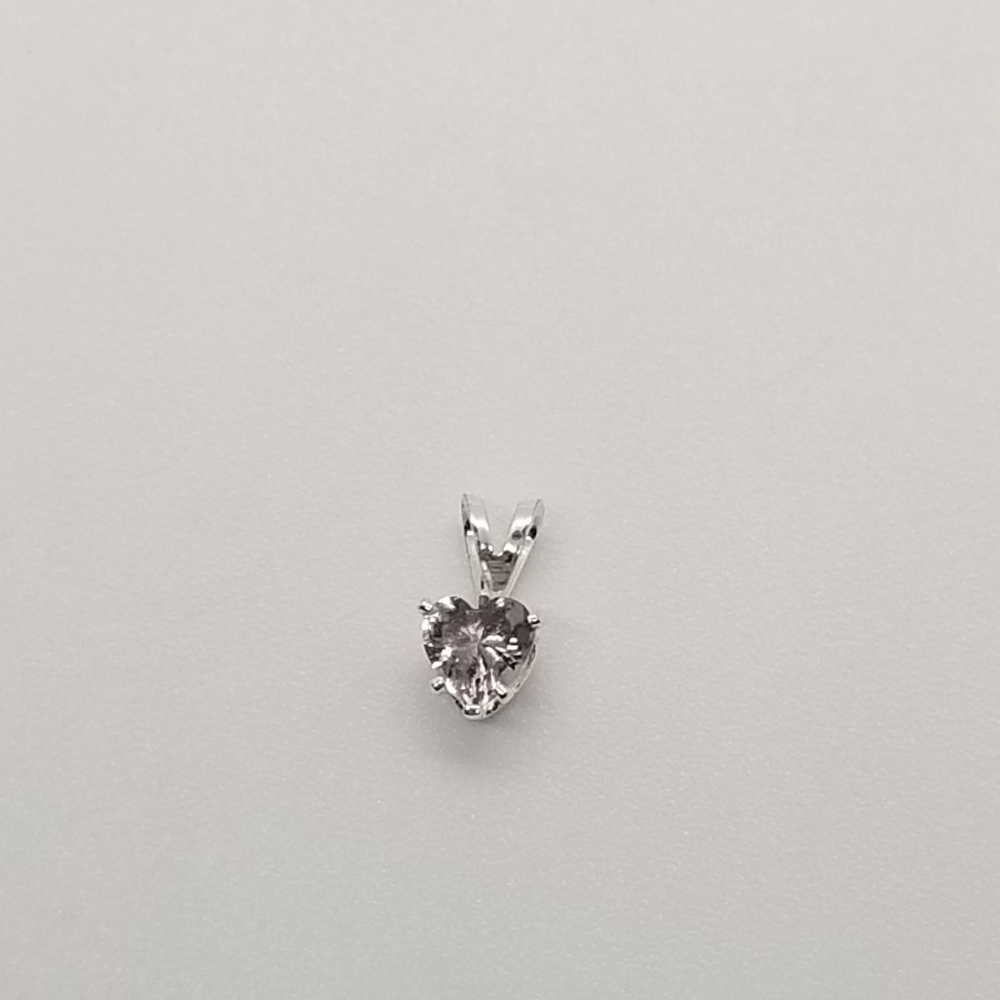 silver tone pendant with light purple crystal heart